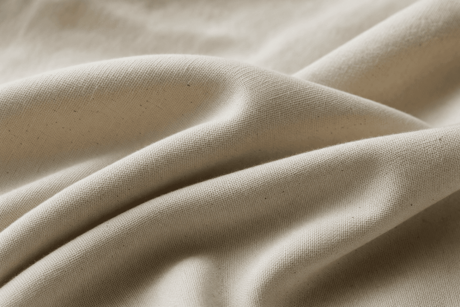 Close-up of natural fabric texture in soft neutral light